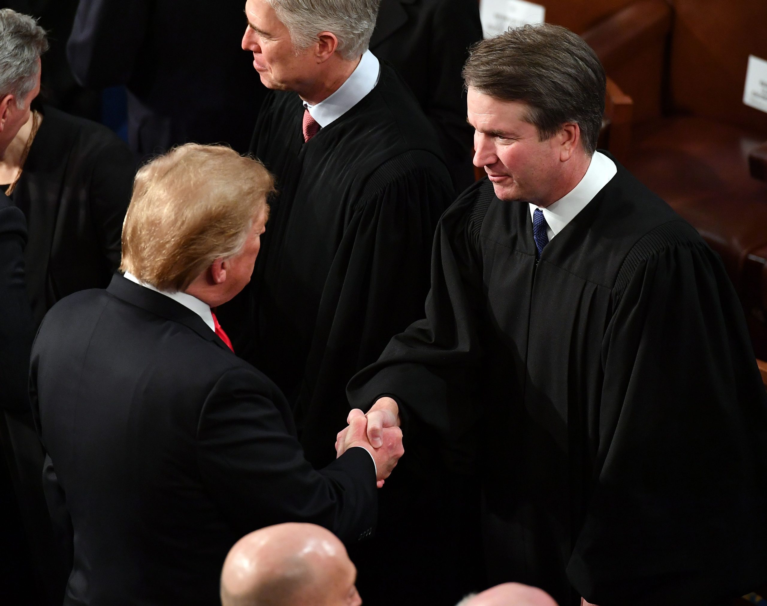 Trump shaking Brett Kavanaugh’s hand