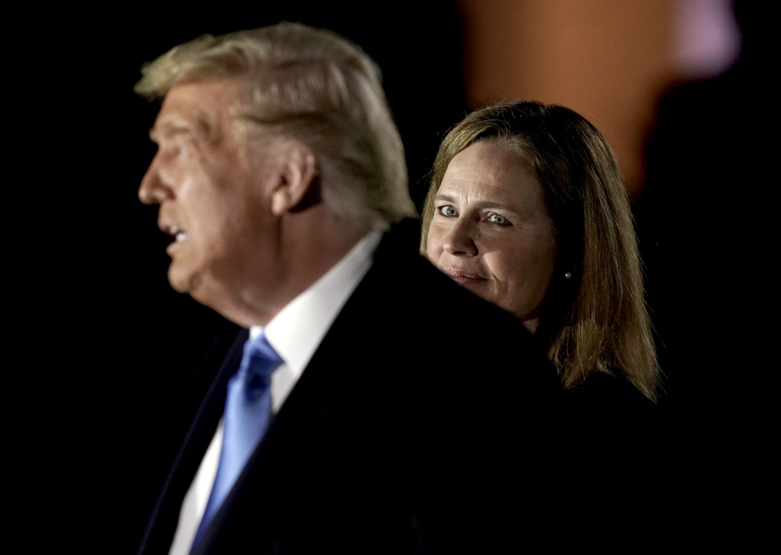 Trump with Amy Coney Barrett beside him