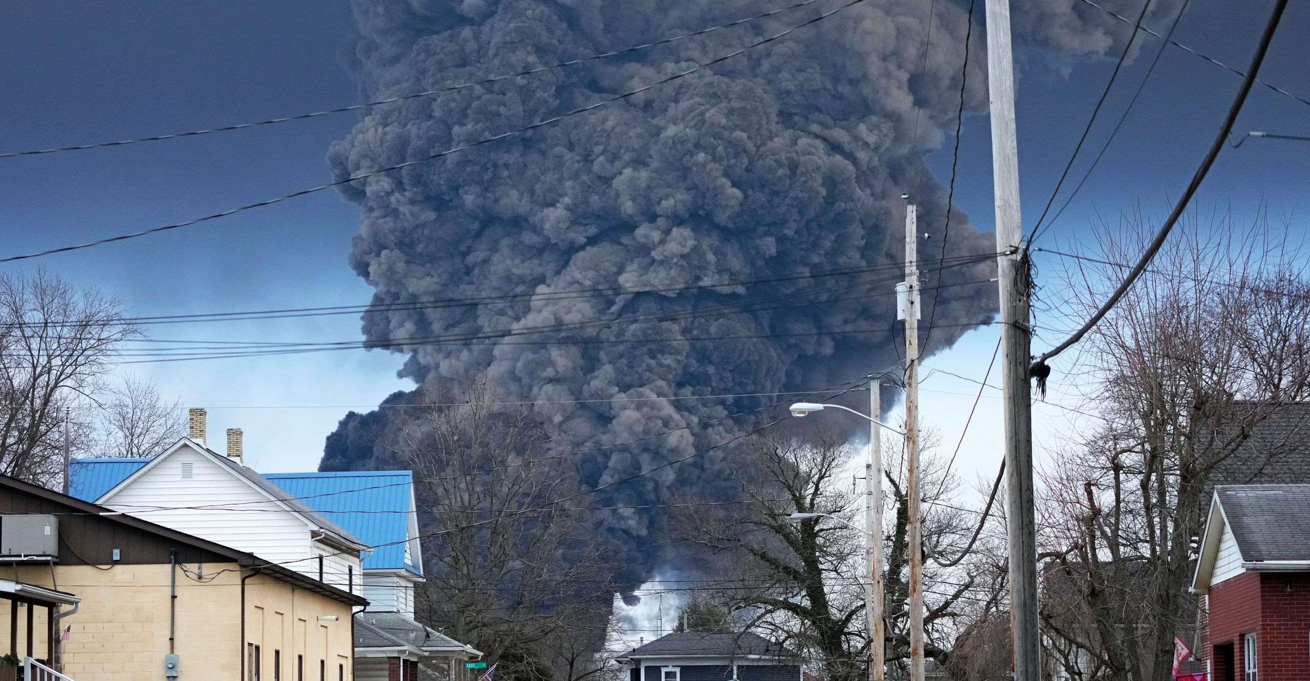 A controlled burn that released a dark cloud of smoke in a neighborhood A controlled burn that released a dark cloud of smoke in a neighborhood
