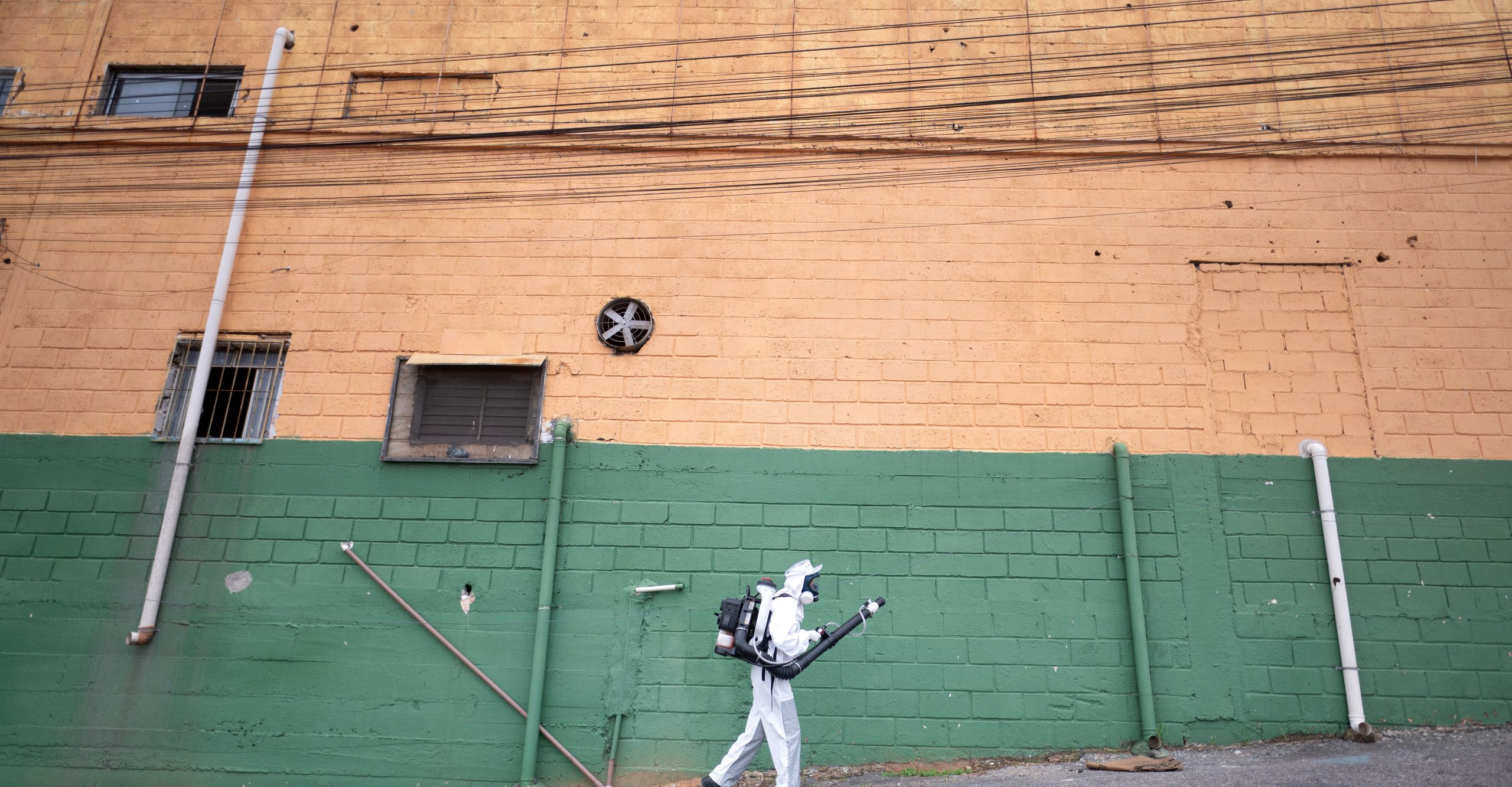 A health worker fumigates