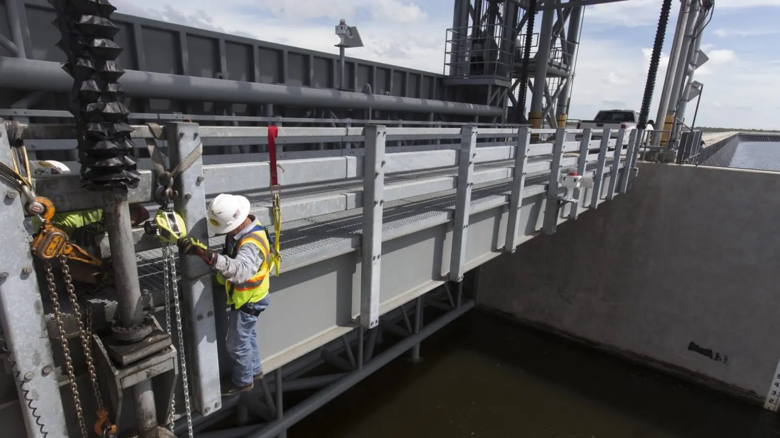 A construction worker repairing the Lake Borgne Surge Barrier